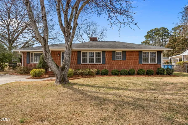 front view of a house and a yard