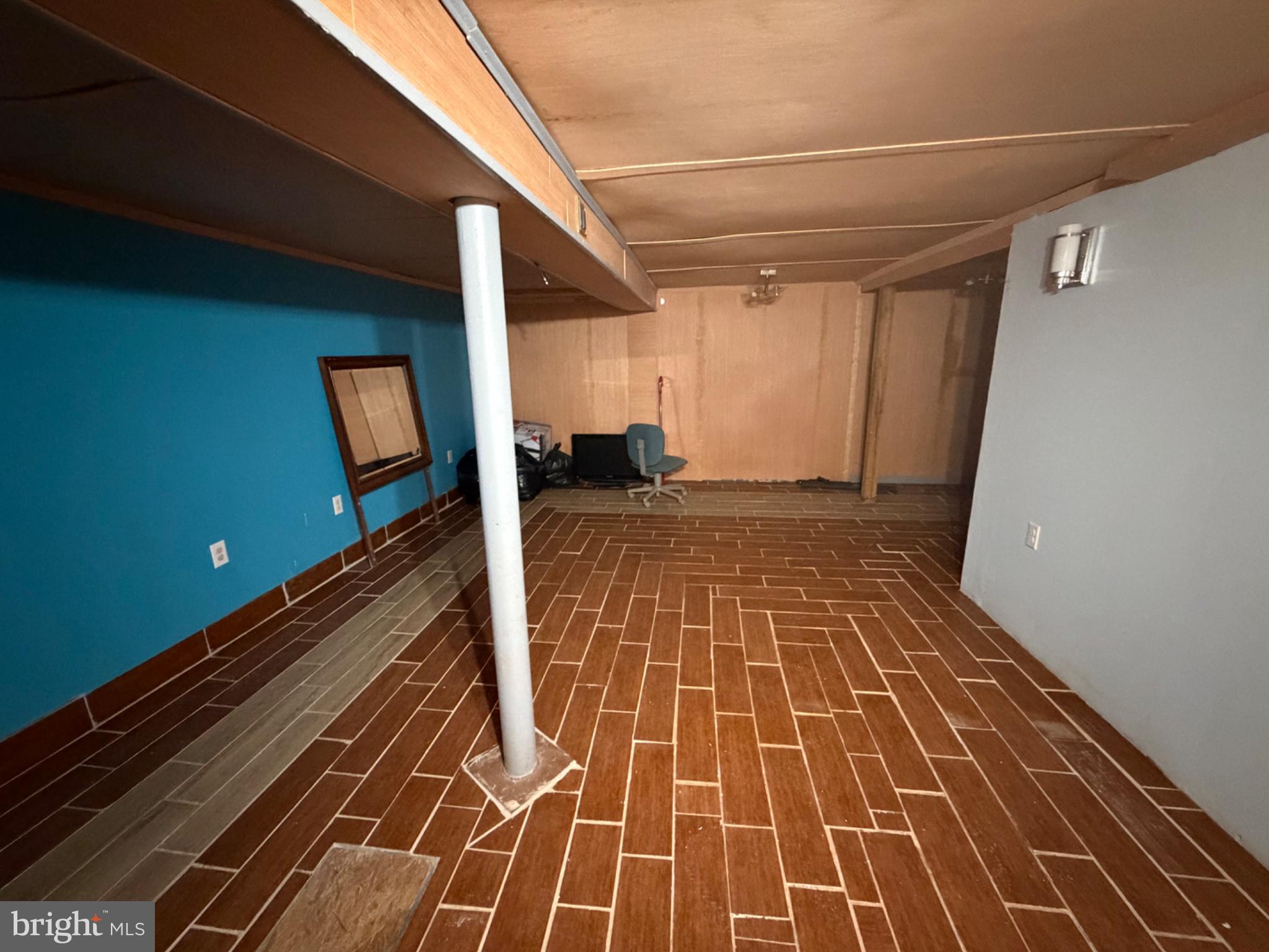 1235 South Blue Ridge Avenue Culpeper, VA 22701 - Photo 12 of 20 Spacious basement with modern flooring.