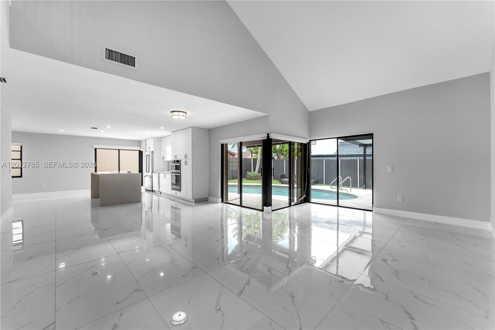 6327 Southwest 127th Place Miami, FL 33183 - Photo 13 of 48 a view of an entryway with a livingroom