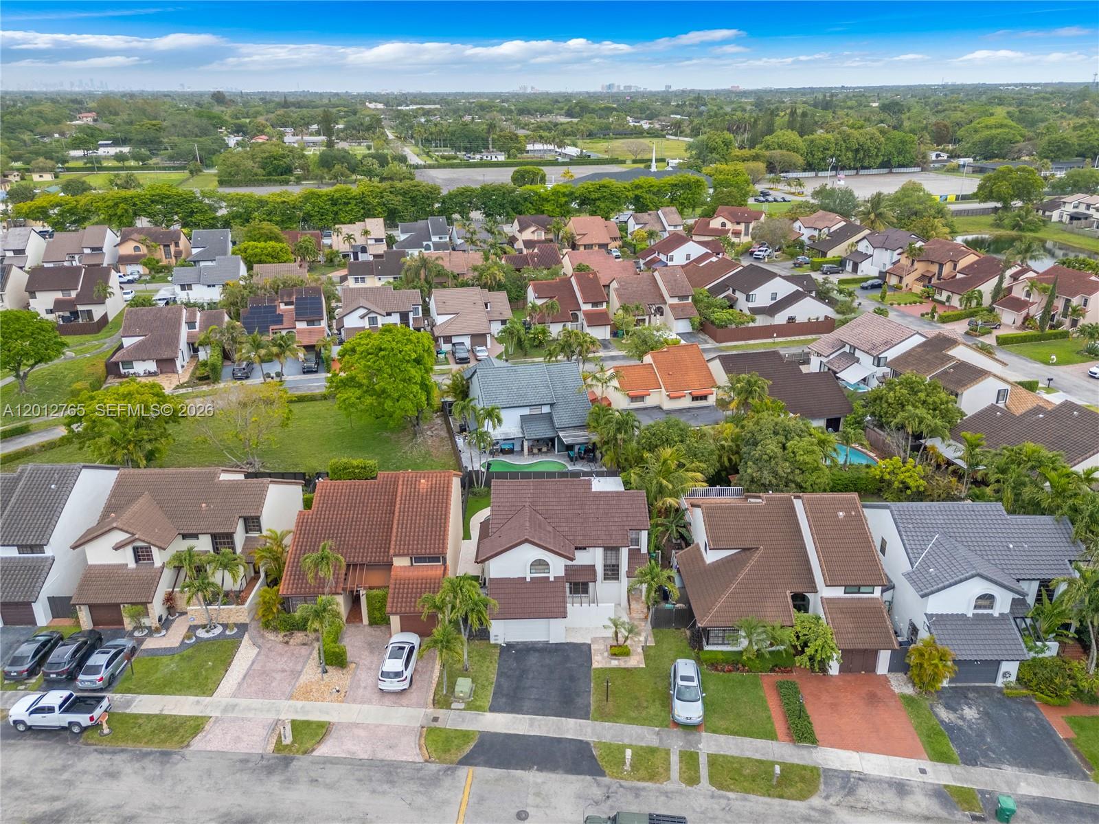 6327 Southwest 127th Place Miami, FL 33183 - Photo 37 of 48 an aerial view of residential houses with outdoor space