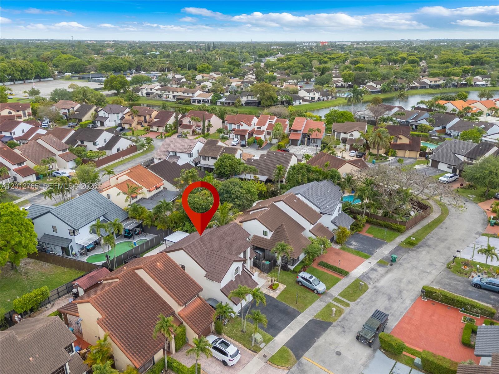 6327 Southwest 127th Place Miami, FL 33183 - Photo 38 of 48 an aerial view of residential houses with outdoor space