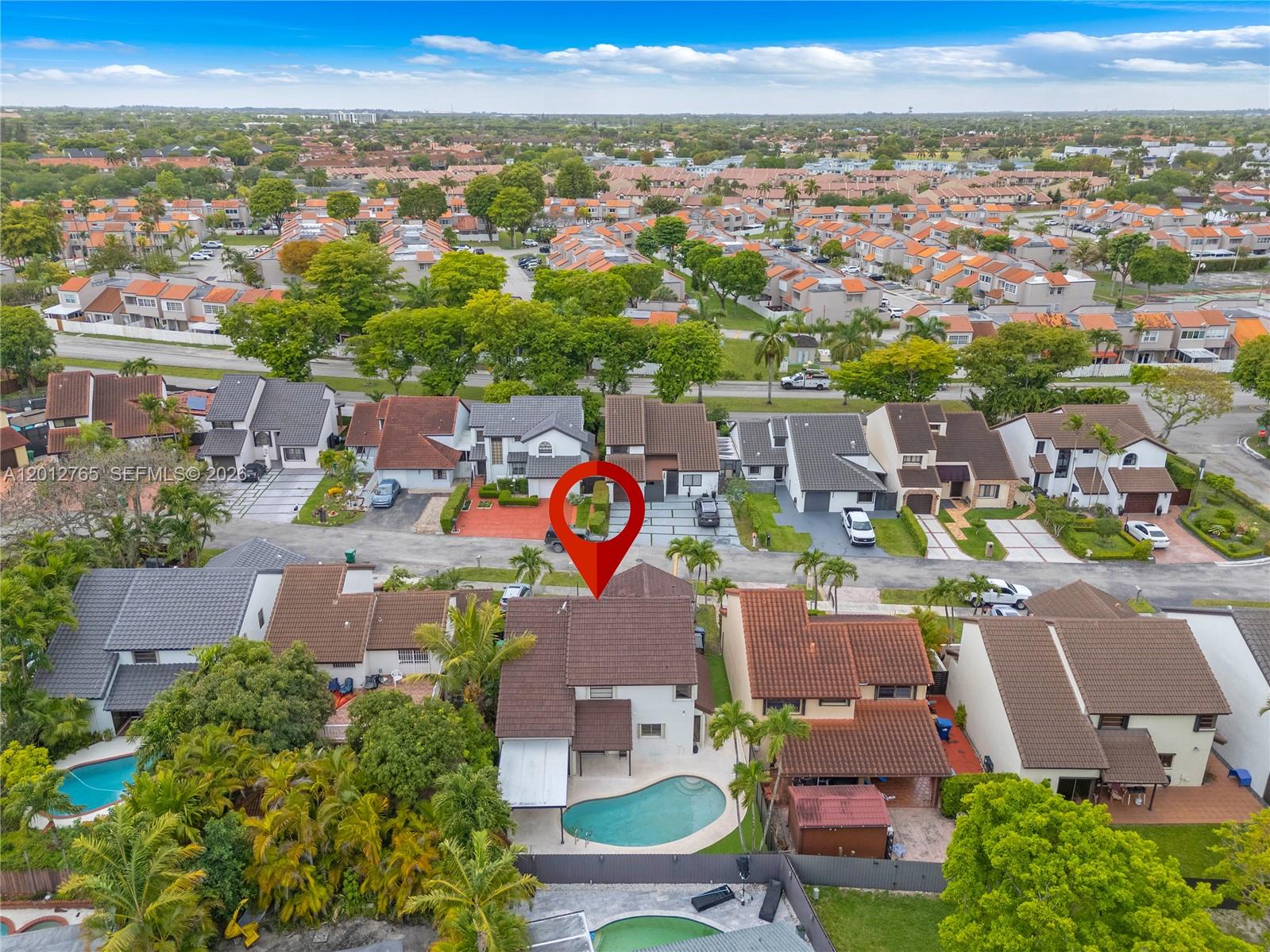 6327 Southwest 127th Place Miami, FL 33183 - Photo 42 of 48 an aerial view of a city