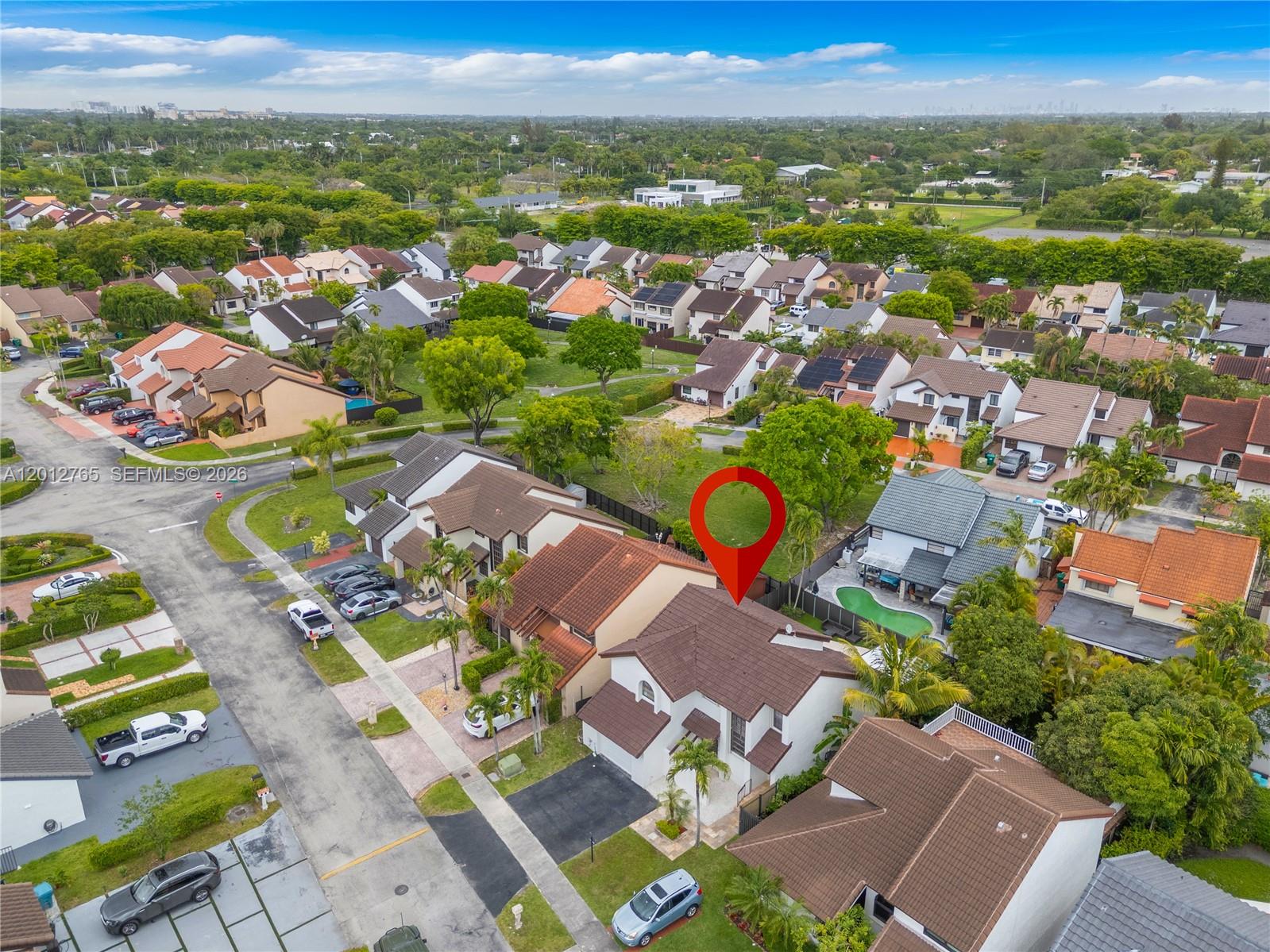 6327 Southwest 127th Place Miami, FL 33183 - Photo 44 of 48 an aerial view of residential houses with outdoor space