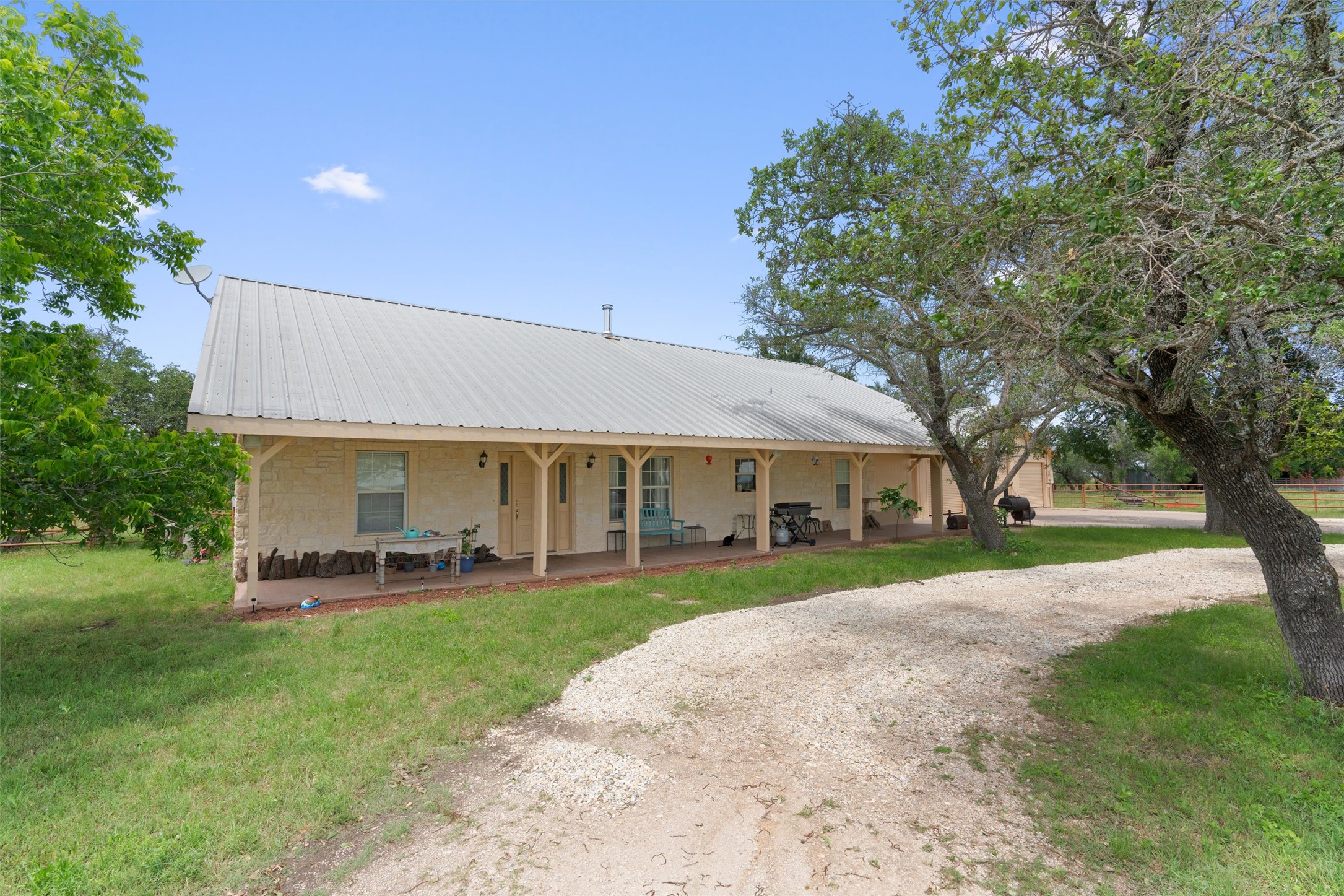 1000 County Road 215 Florence, TX 76527 - Photo 15 of 40 a view of a house with a yard