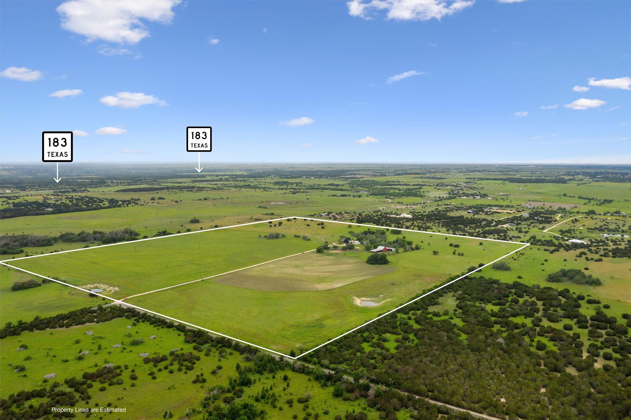1000 County Road 215 Florence, TX 76527 - Photo 2 of 40 a view of an outdoor space and basketball court