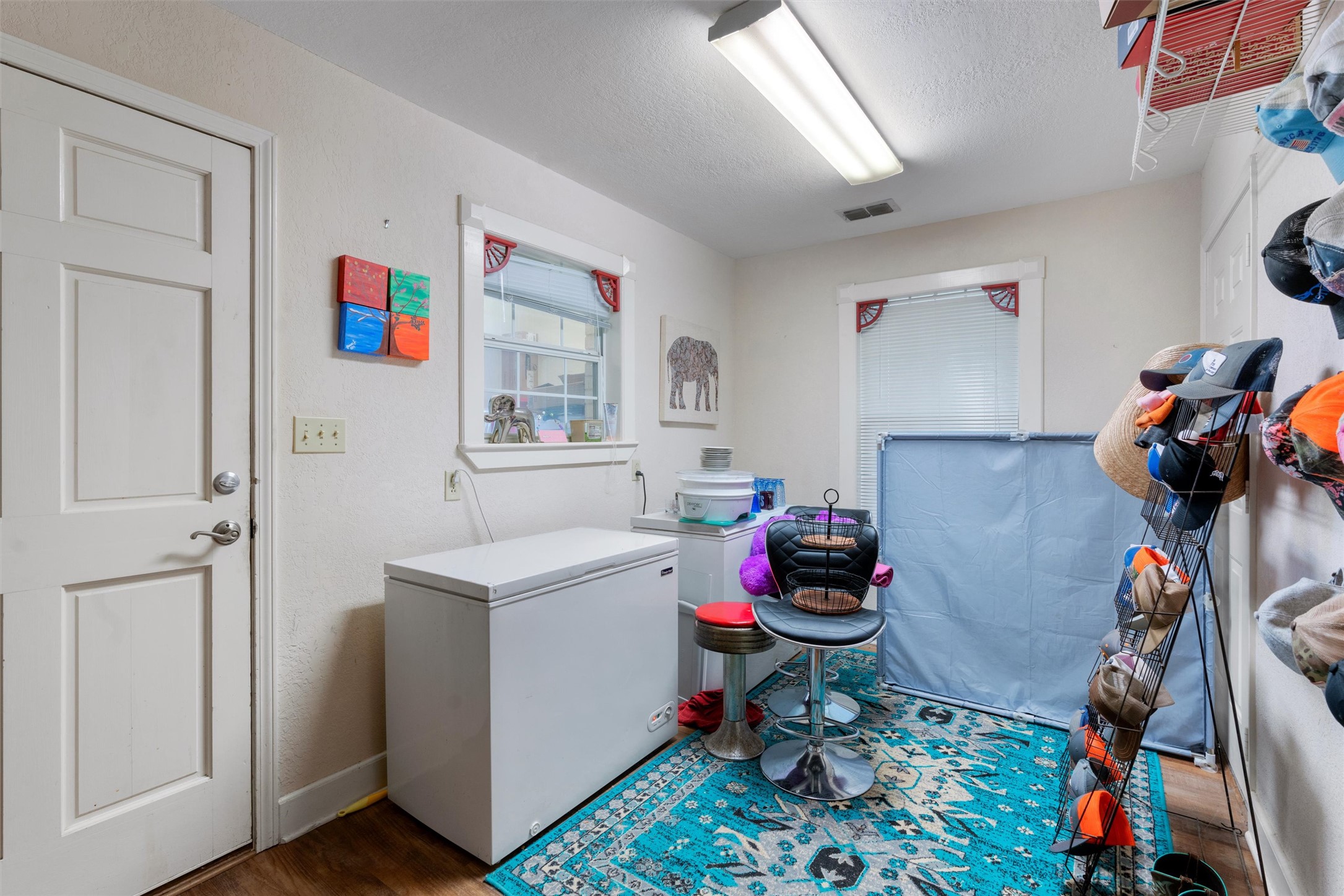 1000 County Road 215 Florence, TX 76527 - Photo 21 of 40 a storage room with washer and dryer