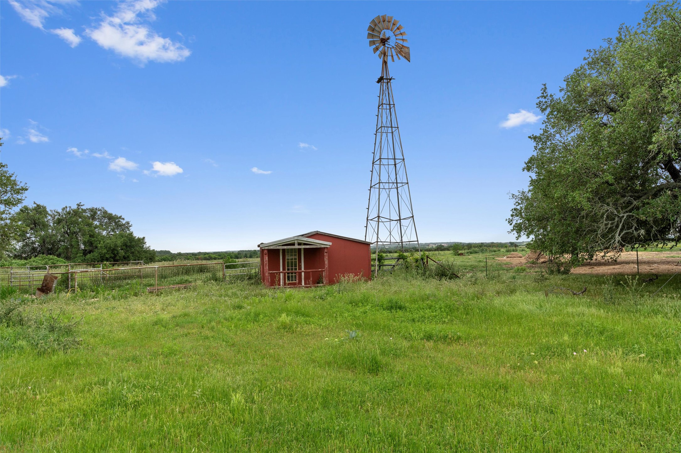 1000 County Road 215 Florence, TX 76527 - Photo 27 of 40 a view of a house with a yard