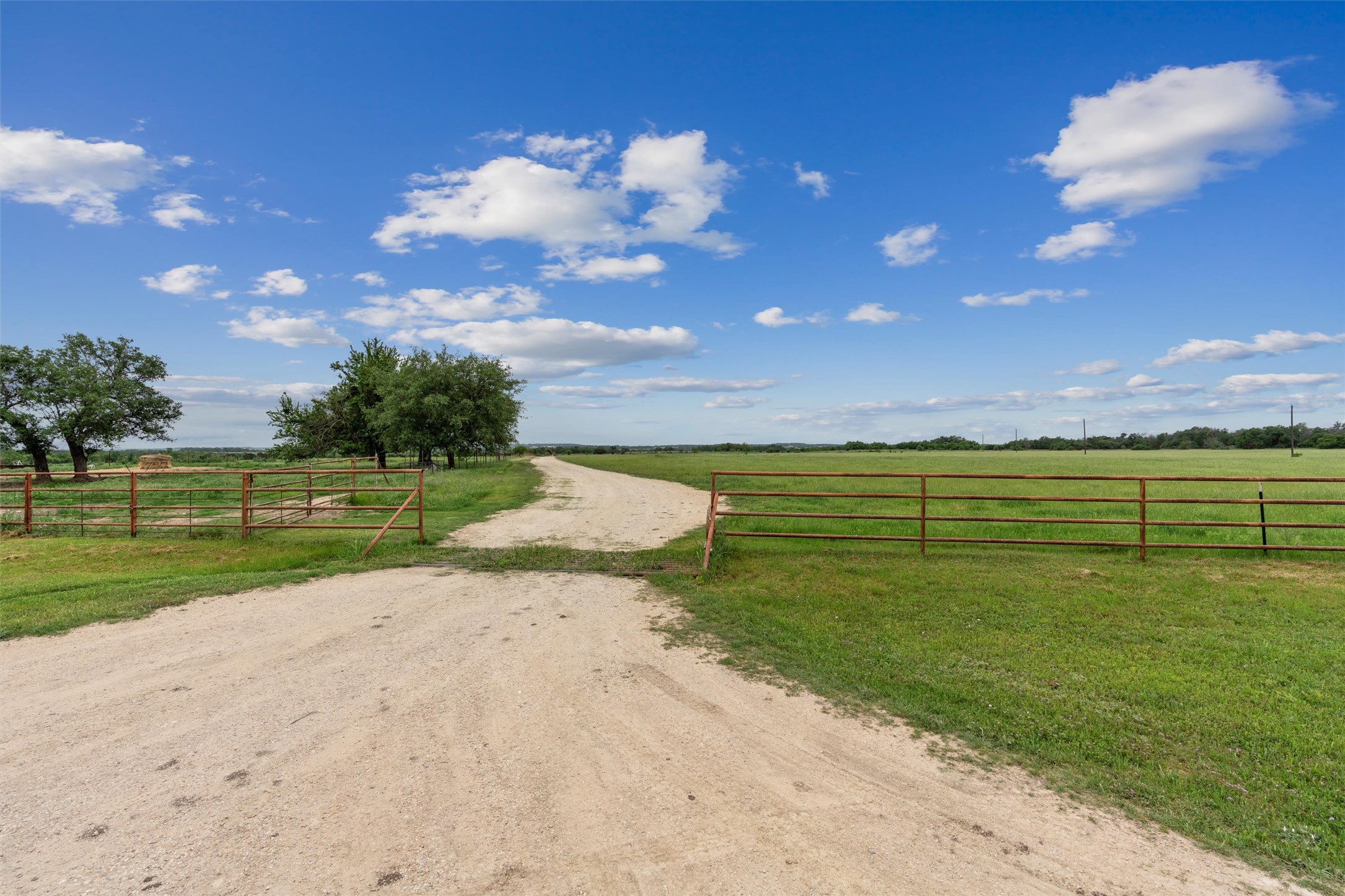 1000 County Road 215 Florence, TX 76527 - Photo 10 of 40 a view of a golf course with a lake