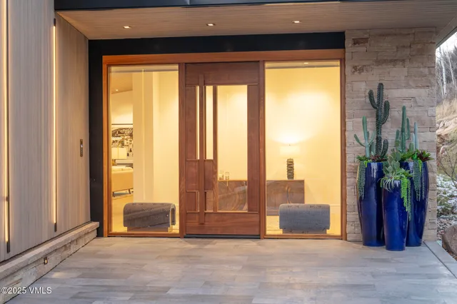 a view of a room with floor to ceiling windows