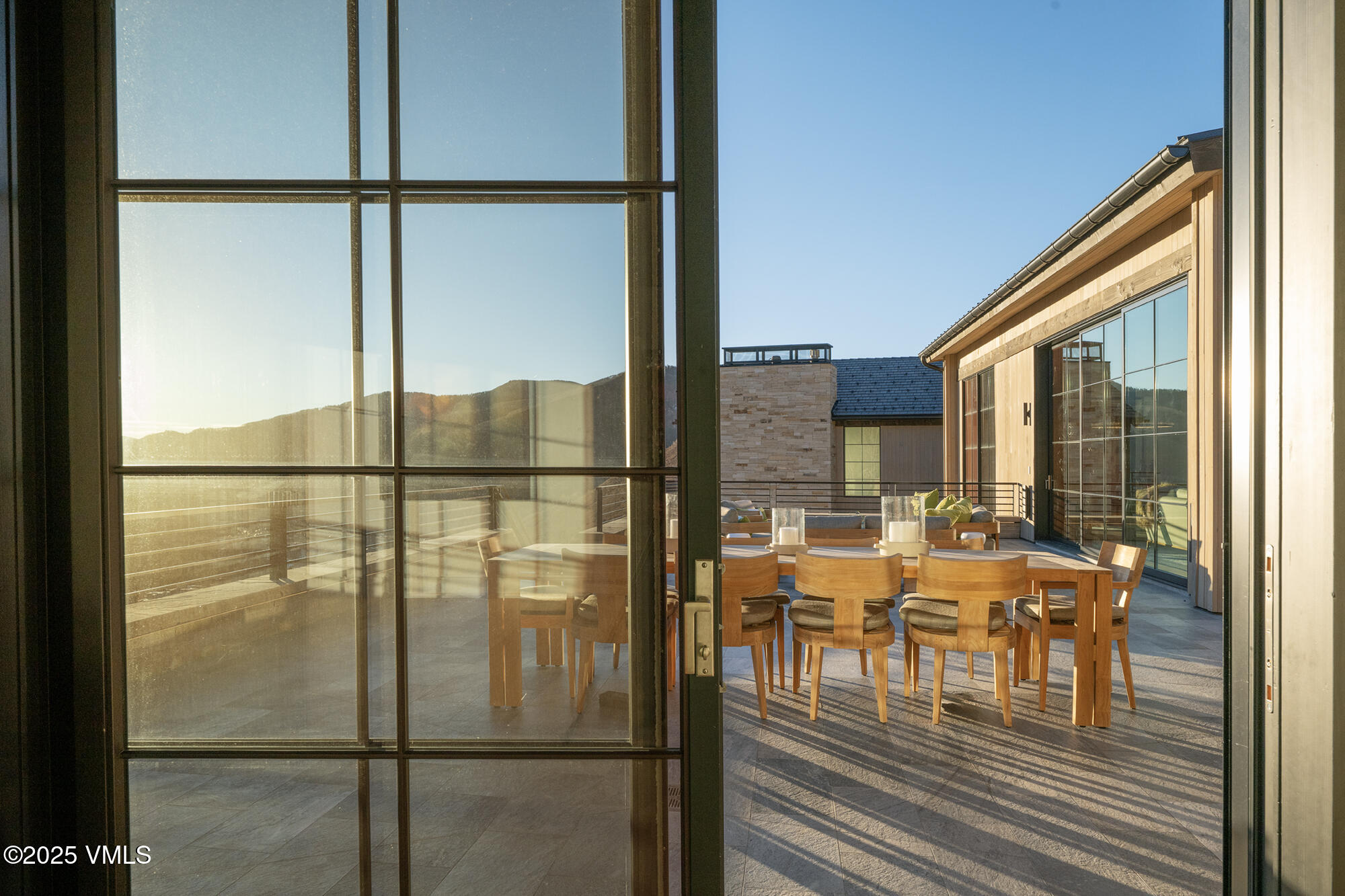 1326 Spraddle Creek Road Vail, CO 81657 - Photo 12 of 26 a dining room with furniture window and outside view