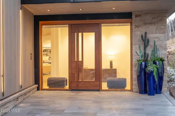 a view of a room with floor to ceiling windows