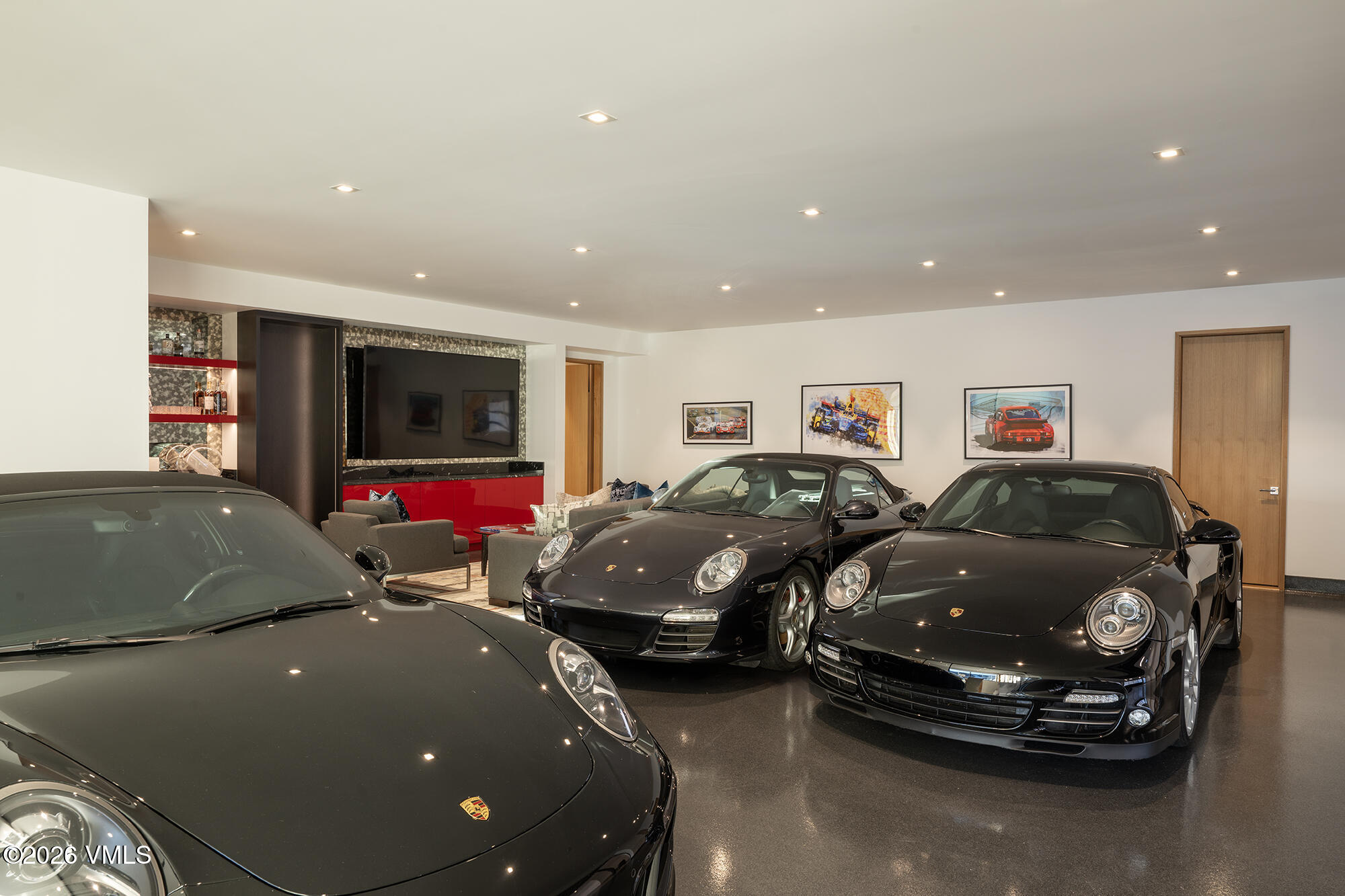 1326 Spraddle Creek Road Vail, CO 81657 - Photo 24 of 26 a living room with furniture and a flat screen tv
