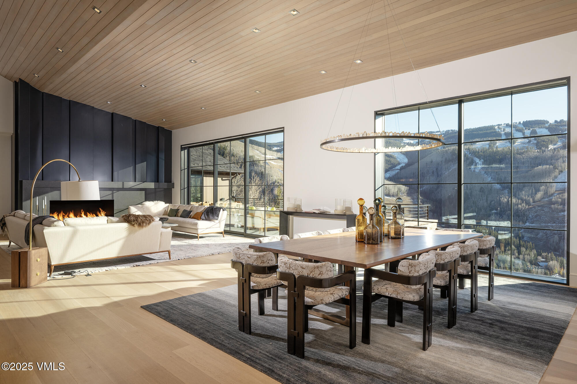 1326 Spraddle Creek Road Vail, CO 81657 - Photo 4 of 26 a view of a dining room with furniture window and outside view