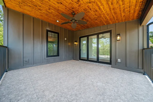 a view of an empty room with a sliding door