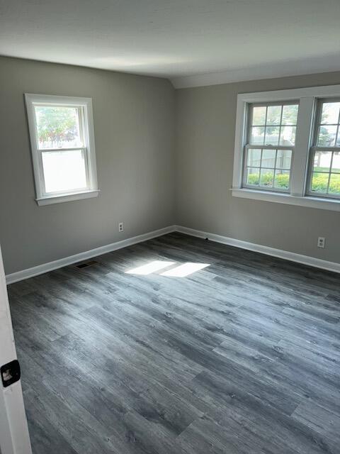 32 Fifth Avenue Hyannis, MA 02601 - Photo 6 of 11 a view of an empty room with wooden floor and a window