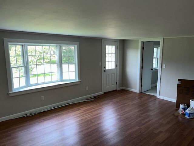 32 Fifth Avenue Hyannis, MA 02601 - Photo 8 of 11 a view of an empty room with window and wooden floor