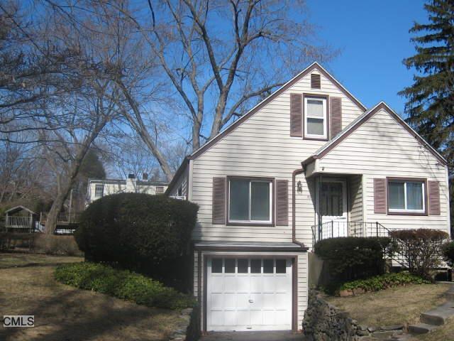 80 Old Elm Road Fairfield, CT 06825 - Photo 1 of 1 a front view of a house with a yard