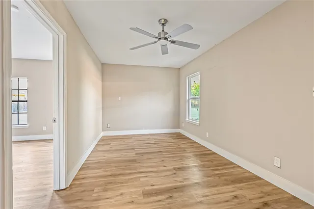 a view of an entryway with wooden floor
