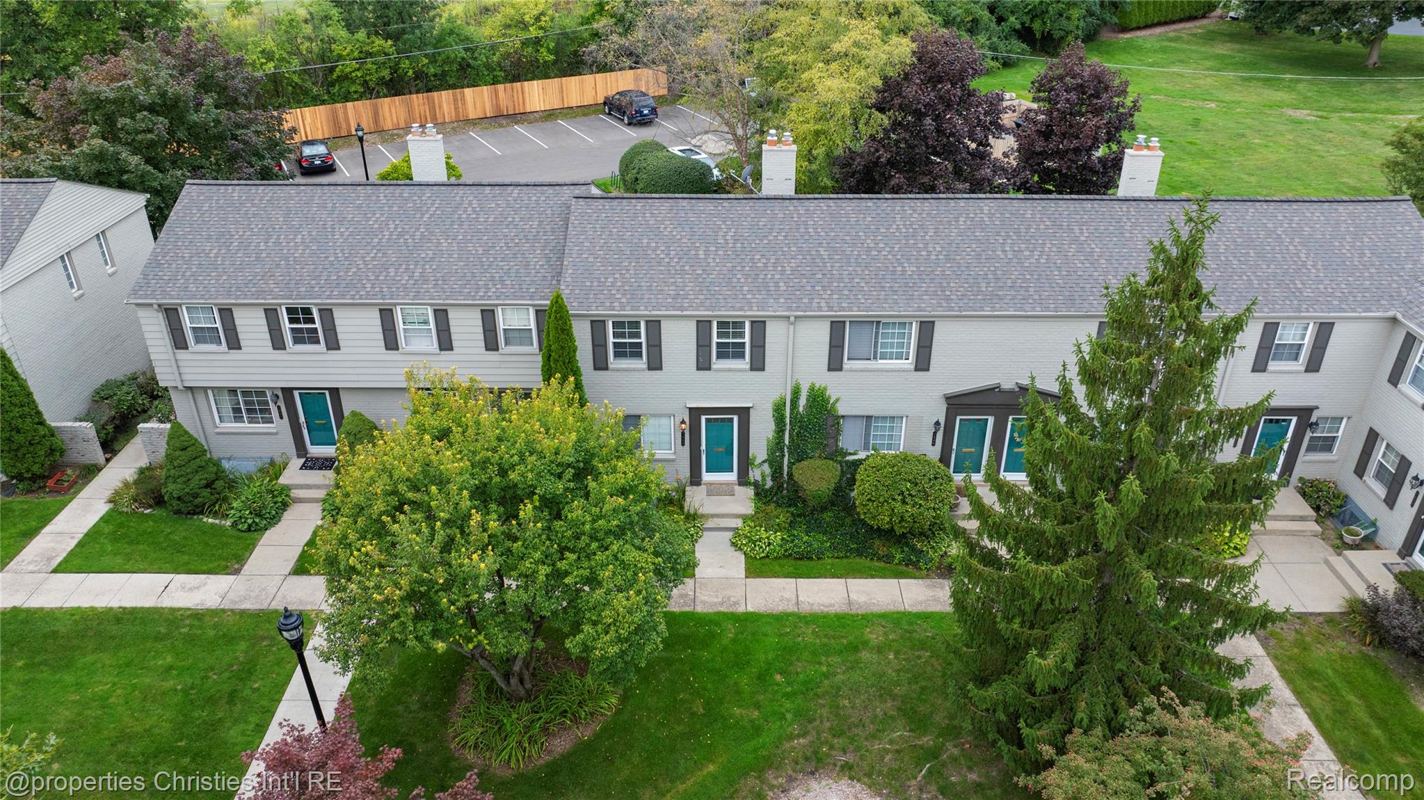 1642 Graefield Road, Unit 75 Birmingham, MI 48009 - Photo 25 of 25 Gray shingled roofs complement the light-colored exteriors