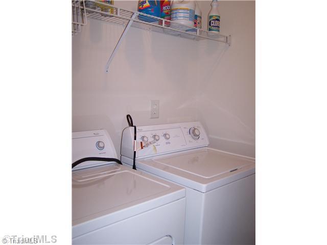133 James High Point, Unit 1C High Point, NC 27265 - Photo 12 of 16 Laundry Room. Laundry room comes complete with a washer and dryer.