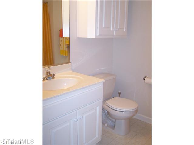 133 James High Point, Unit 1C High Point, NC 27265 - Photo 13 of 16 Bath. Hall bath is spacious and has an additional cabinet for storage.