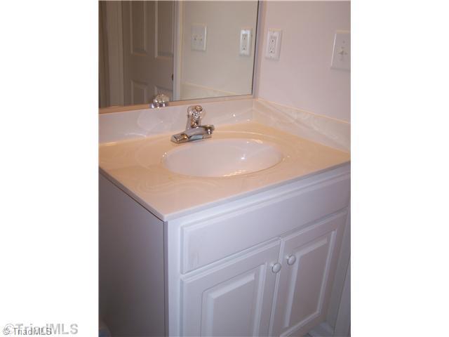 133 James High Point, Unit 1C High Point, NC 27265 - Photo 15 of 16 Bath. Master bath has an extra cabinet for storage.