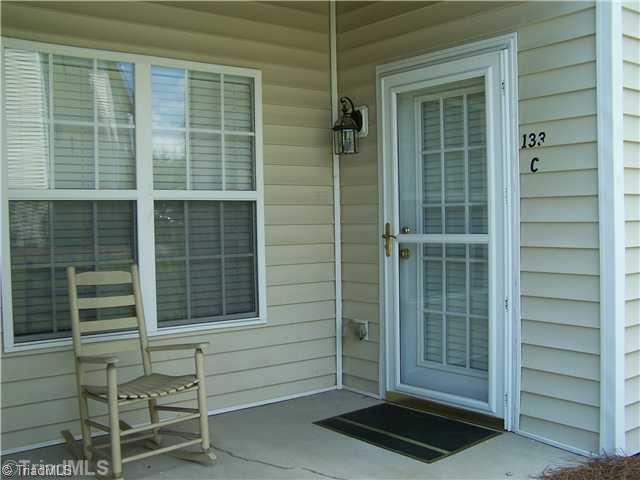 133 James High Point, Unit 1C High Point, NC 27265 - Photo 4 of 16 Exterior Front. The great thing about this condo is that you have a parking area very close to the patio, so you can park and walk right in.
