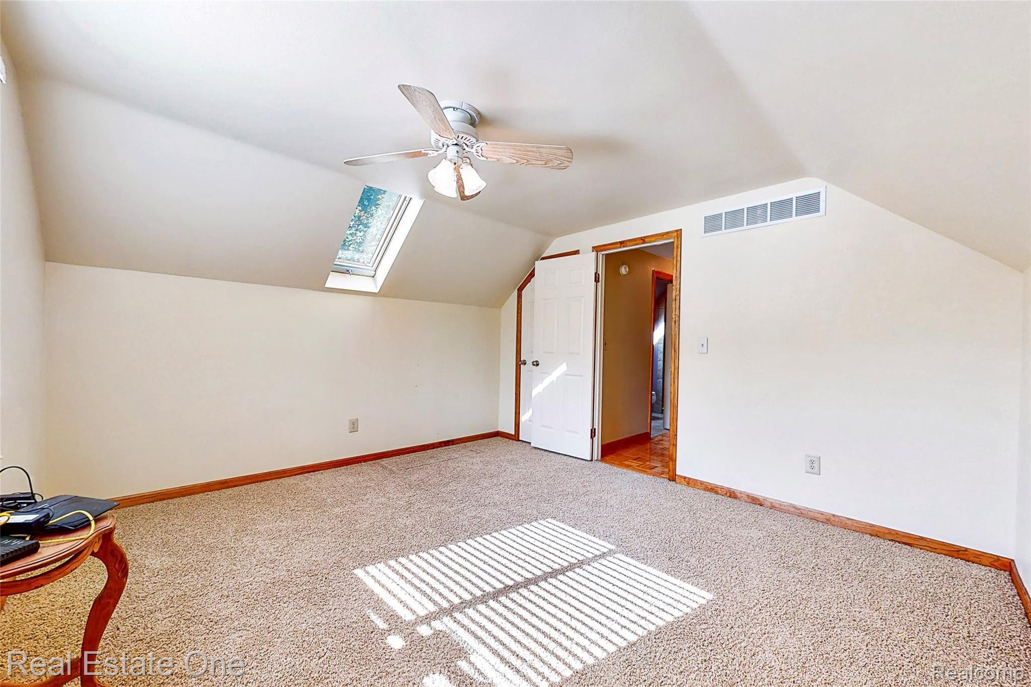 8120 Green Road Fenton, MI 48430 - Photo 38 of 46 Fourth bedroom with sky light.