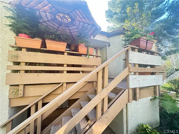 a bathroom with a window and a shower