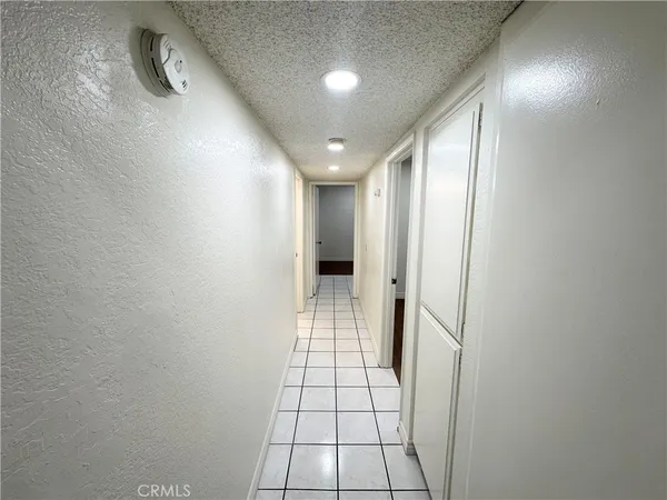 a bathroom with a double vanity sink toilet and shower