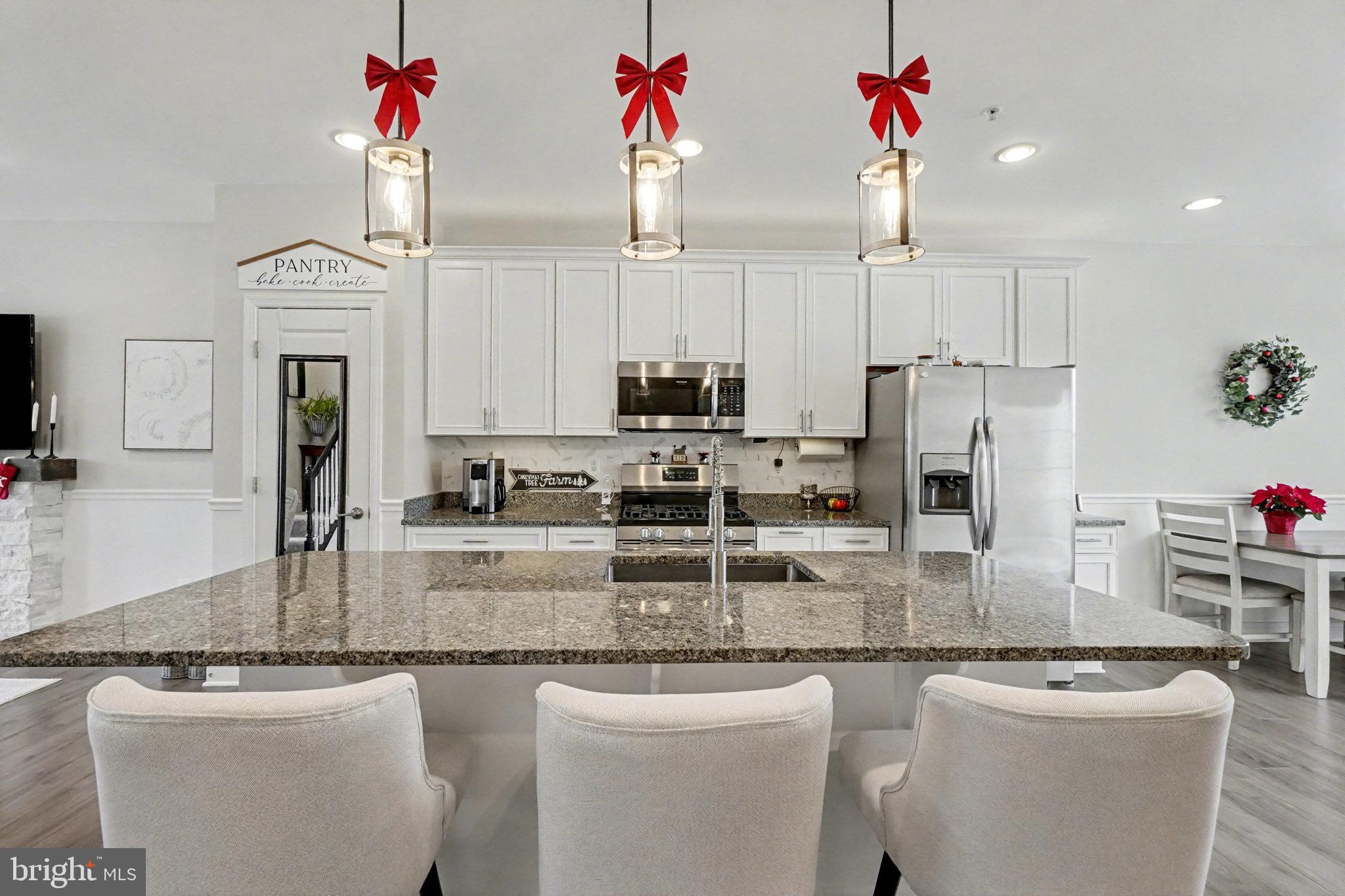 1225 Fenwick Road Aberdeen, MD 21001 - Photo 11 of 52 a kitchen with stainless steel appliances granite countertop a sink refrigerator and cabinets