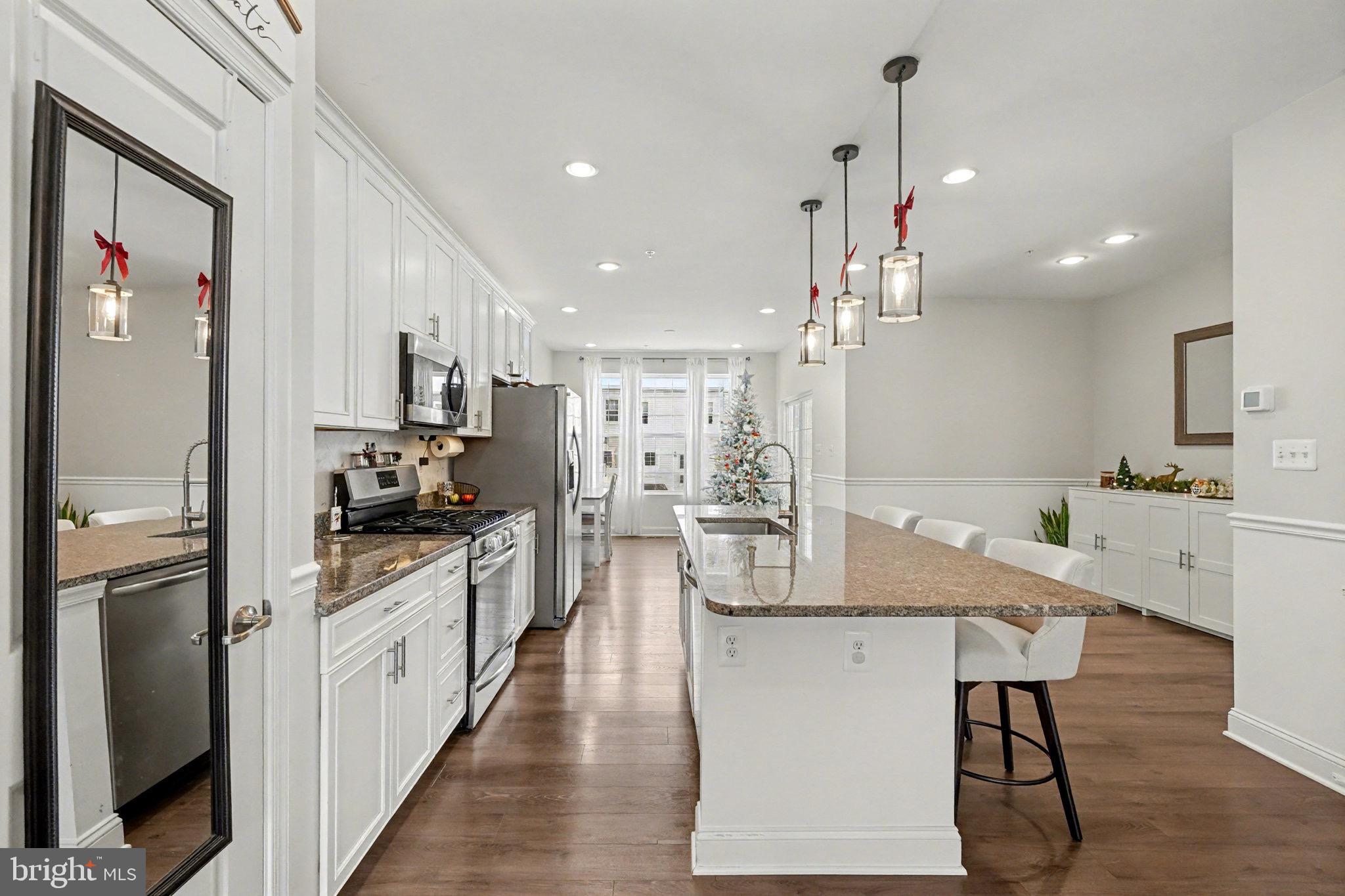 1225 Fenwick Road Aberdeen, MD 21001 - Photo 15 of 52 a kitchen with kitchen island granite countertop lots of counter top space and stainless steel appliances