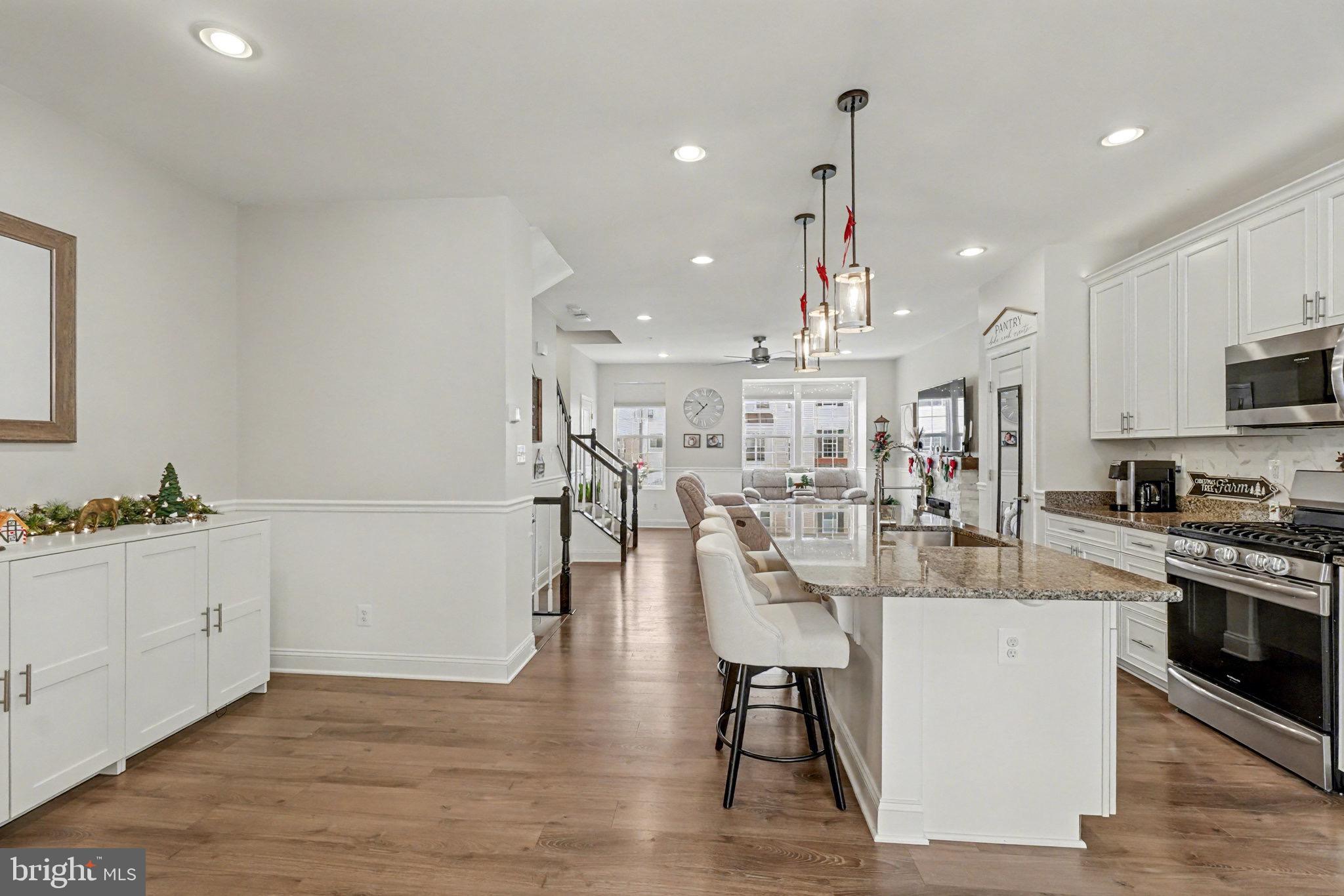 1225 Fenwick Road Aberdeen, MD 21001 - Photo 20 of 52 a large white kitchen with lots of counter space and appliances
