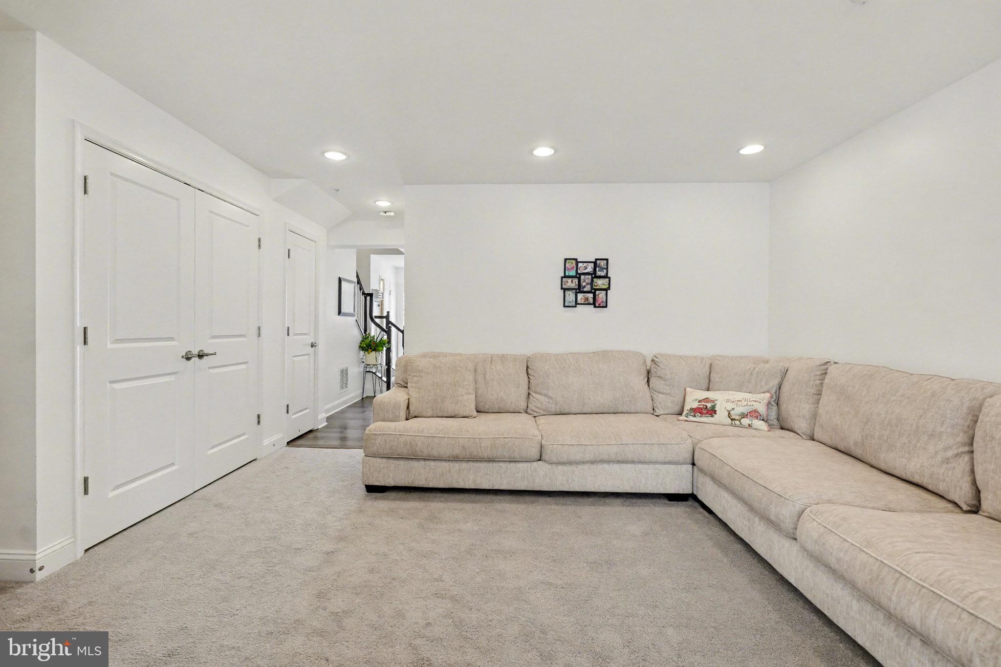 1225 Fenwick Road Aberdeen, MD 21001 - Photo 23 of 52 a living room with furniture and a white wall