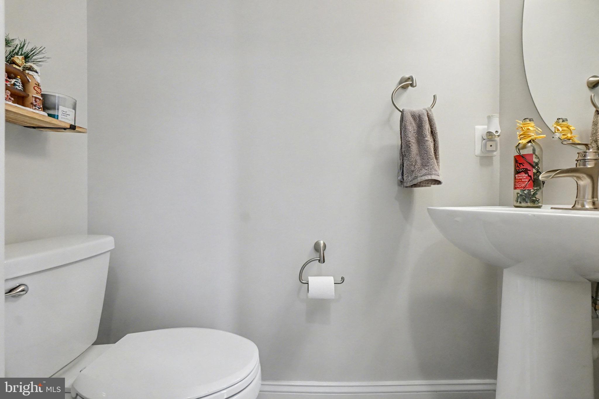 1225 Fenwick Road Aberdeen, MD 21001 - Photo 25 of 52 a bathroom with a sink and a toilet