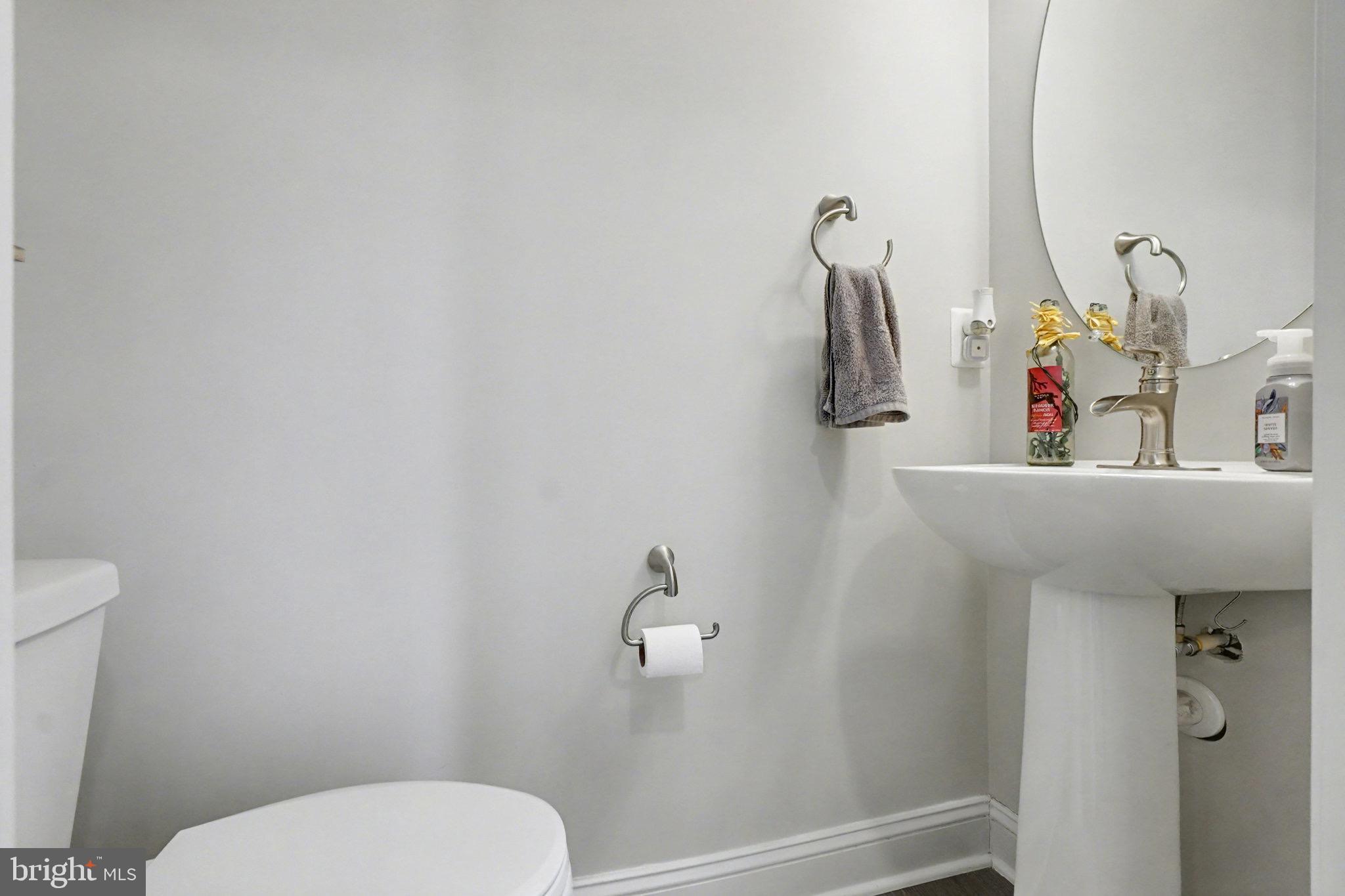 1225 Fenwick Road Aberdeen, MD 21001 - Photo 26 of 52 a bathroom with a toilet and a sink