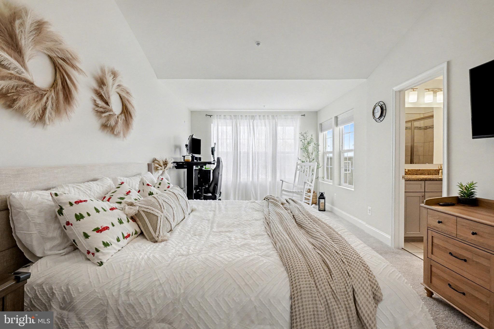 1225 Fenwick Road Aberdeen, MD 21001 - Photo 28 of 52 a bedroom with a bed and a flat tv screen on dresser