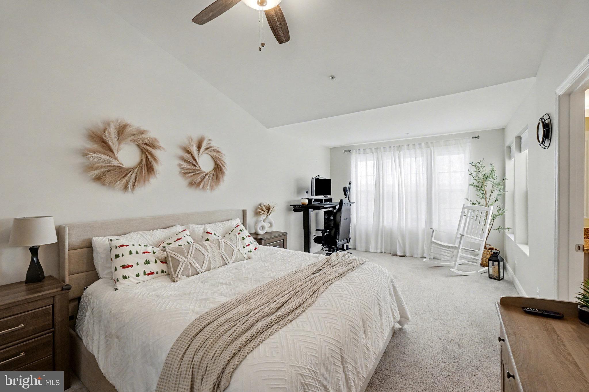 1225 Fenwick Road Aberdeen, MD 21001 - Photo 30 of 52 a bedroom with a bed and a chandelier