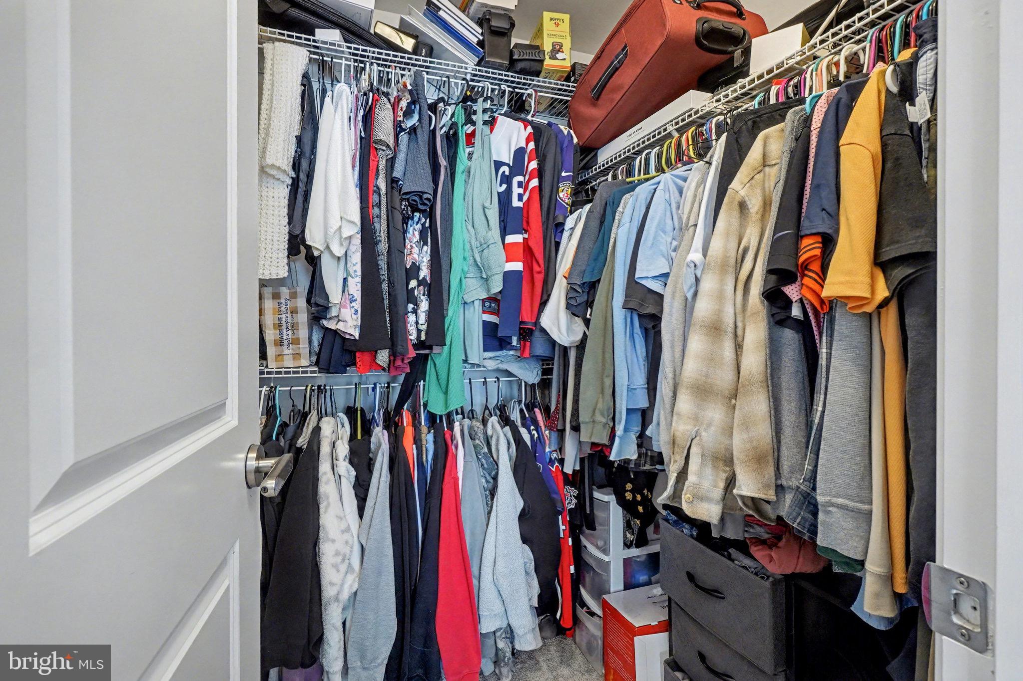 1225 Fenwick Road Aberdeen, MD 21001 - Photo 31 of 52 a view of walk in closet with clothes