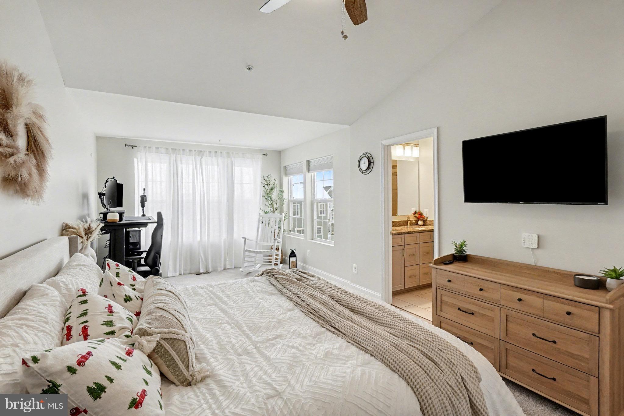 1225 Fenwick Road Aberdeen, MD 21001 - Photo 32 of 52 a bedroom with a bed and a flat tv screen on the dresser