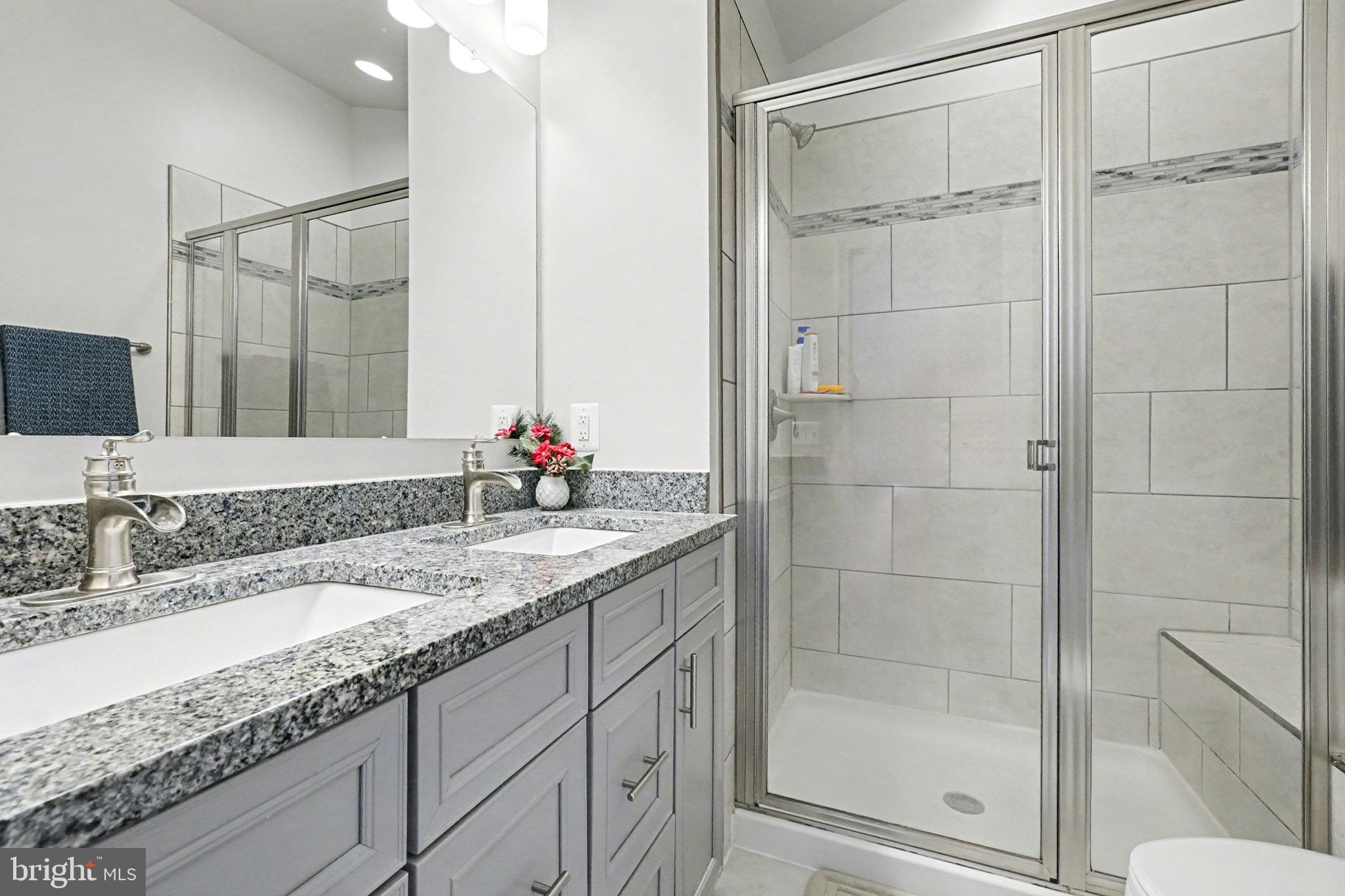 1225 Fenwick Road Aberdeen, MD 21001 - Photo 34 of 52 a bathroom with a granite countertop sink and a mirror