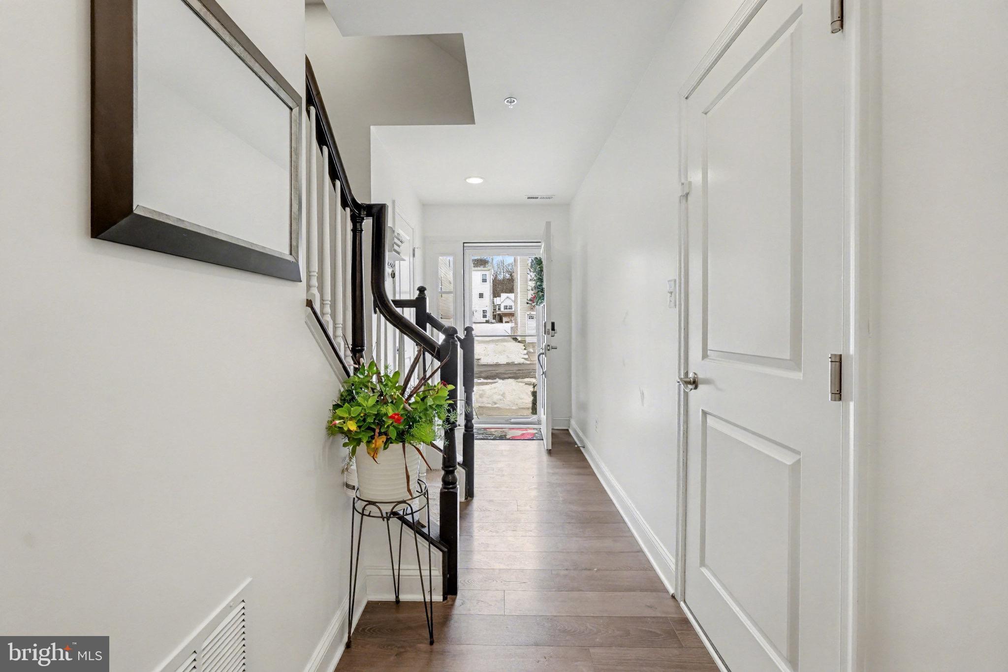 1225 Fenwick Road Aberdeen, MD 21001 - Photo 4 of 52 a hallway with wooden floor and entryway