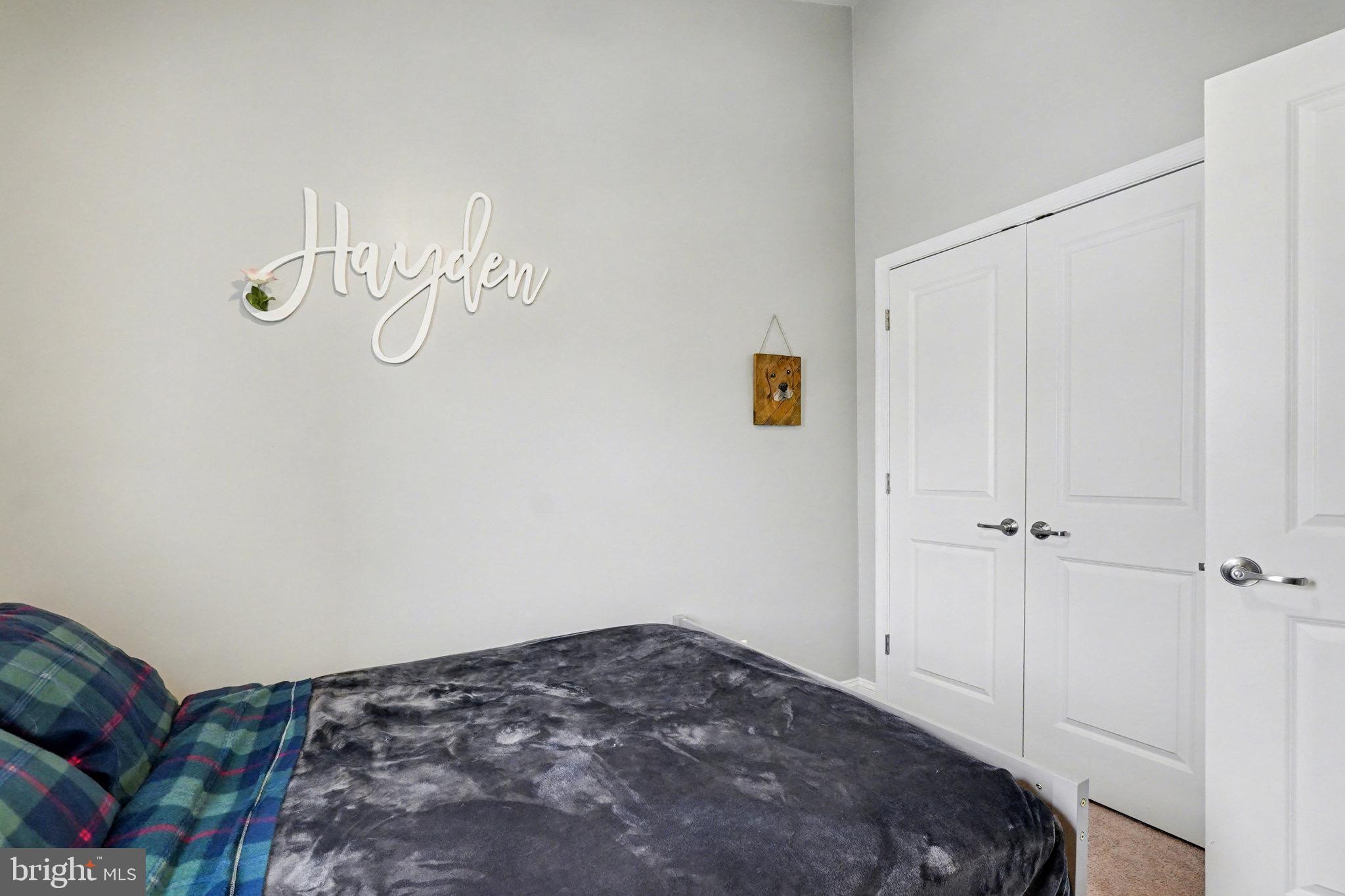 1225 Fenwick Road Aberdeen, MD 21001 - Photo 42 of 52 a bedroom with a bed and cabinets