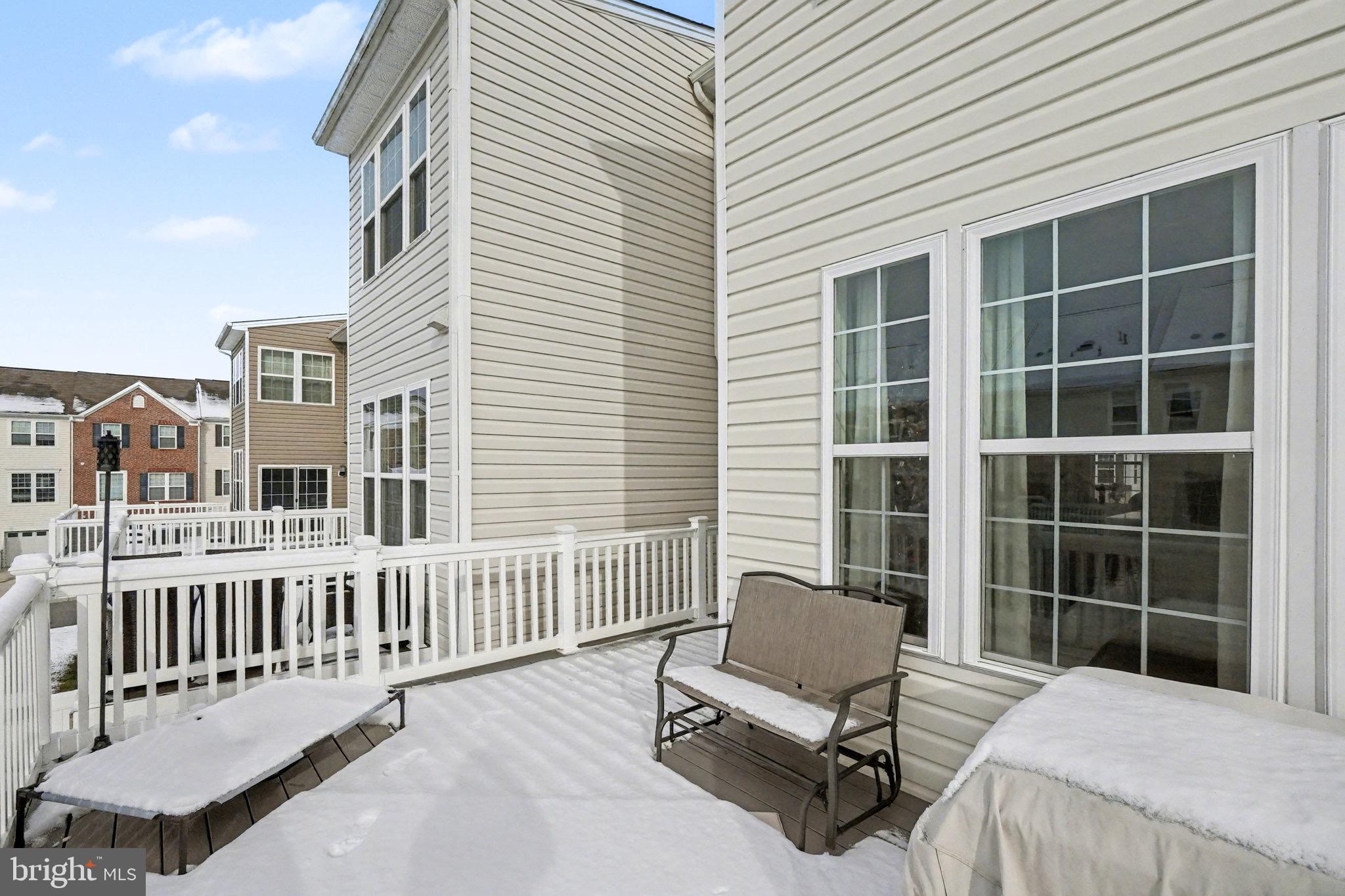 1225 Fenwick Road Aberdeen, MD 21001 - Photo 43 of 52 a balcony with a couch and a table