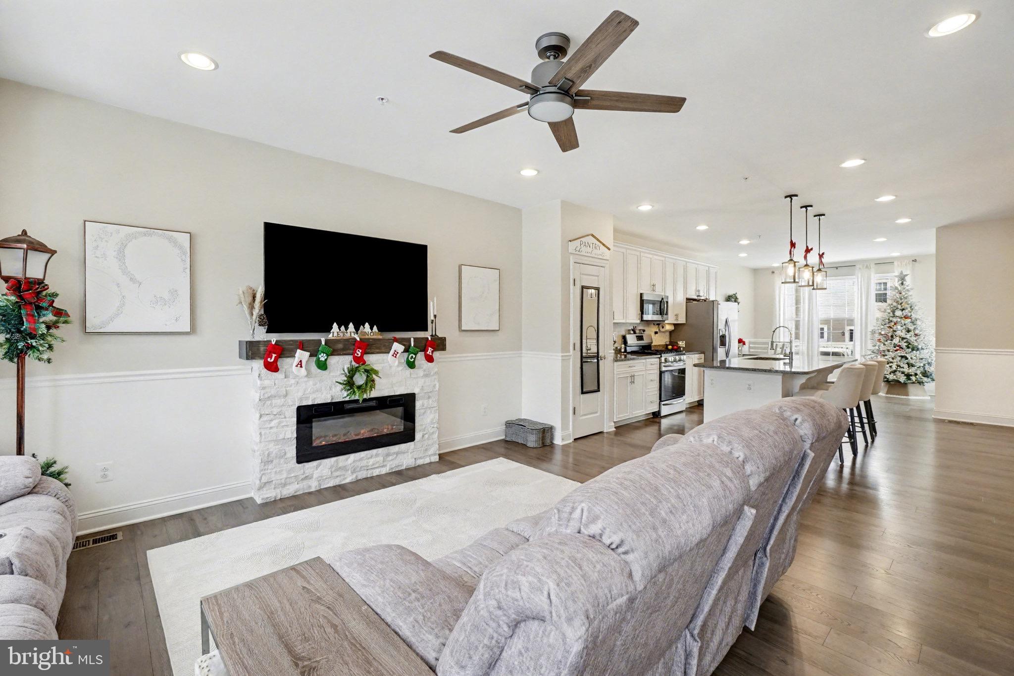 1225 Fenwick Road Aberdeen, MD 21001 - Photo 8 of 52 a living room with furniture and a flat screen tv