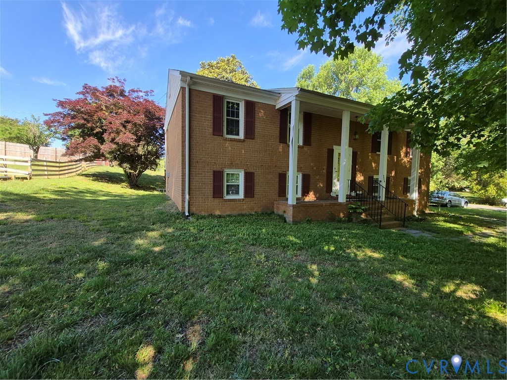 3818 Cedar Grove Road Richmond, VA 23235 - Photo 2 of 20 a front view of a house with garden