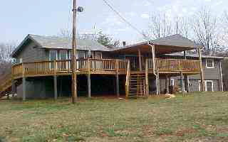 2844 Greenfield Road Afton, VA 22920 - Photo 1 of 3 a front view of a house with a garden