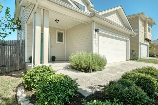 a view of a back yard of the house