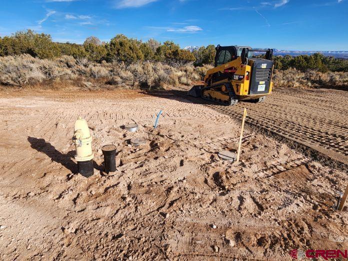 Lot 3 Cedar Mesa Road Cedaredge, CO 81413 - Photo 19 of 20 a view of a yard with wooden fence