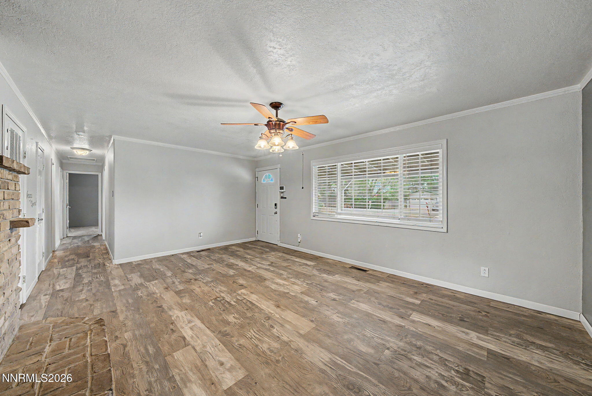11577 Deodar Way Reno, NV 89506 - Photo 19 of 58 a view of an empty room with a window